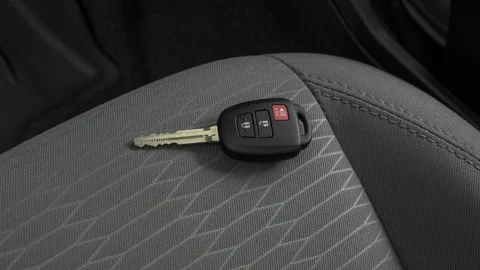 Front seat in car interior with keys close up  2017 Toyota Tacoma SR Stock Footage 159917024