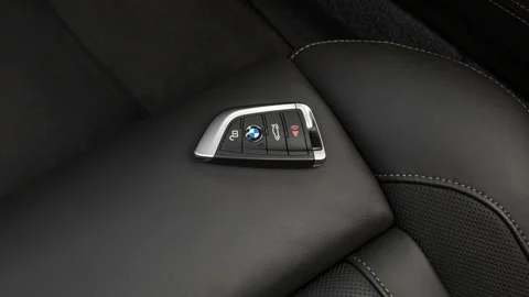 Front seat in car interior with keys close up  2017 BMW X6 M Stock Footage 159935330