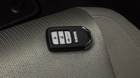 Front seat in car interior with keys close up  2018 Honda Accord LX Stock Footage 159980431