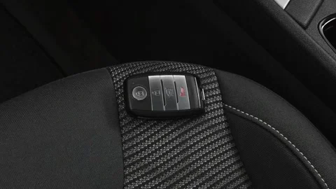 Front seat in car interior with keys close up 2018 Kia Niro LX Stock Footage 159985606