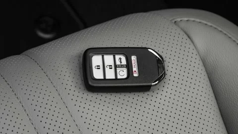 Front seat in car interior with keys close up  2018 Honda Accord Touring Video stock 159996571