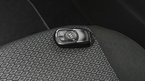 Front seat in car interior with keys close up  2018 Buick Regal Tourx Preferred Stock Footage 160010100