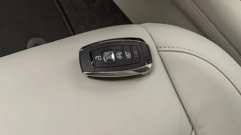 Front seat in car interior with keys close up  2019 Lincoln MKC Select Stock Footage 160016973