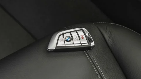 Front seat in car interior with keys close up  2019 BMW 7-series 740i Stock Footage 160017629
