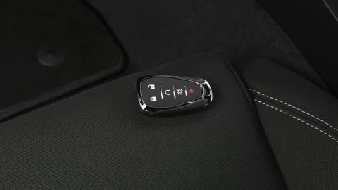 Front seat in car interior with keys close up  2019 Chevrolet Camaro 1LT Stock Footage 160034280