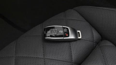 Front seat in car interior with keys close up  2019 Mercedes-Benz E-Class E450 Stock Footage 160036516