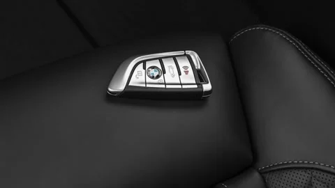 Front seat in car interior with keys close up  2020 BMW 7-series 750i xDrive Stock Footage 160080317
