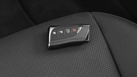 Front seat in car interior with keys close up  2020 Lexus GX GX460 Premium Stock Footage 160093767