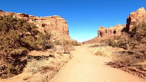A Front Seat View Driving 4x4 Vehicle through Little Canyon in Moab, Utah Stock Footage 261040077