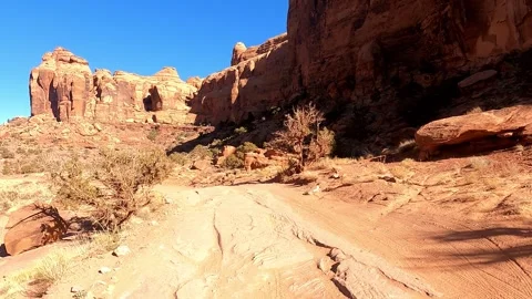 A front seat view driving through Little Canyon in the Moab wilderness of Utah Stock Footage 261990877