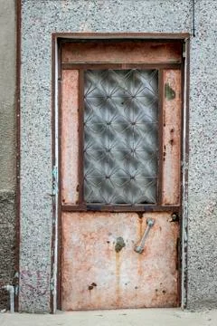 Front shoot of open brown colored metal door with traditional turkish pattern Stock Photos