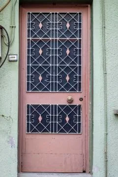Front shoot of open brown colored metal door with traditional turkish pattern Stock Photos