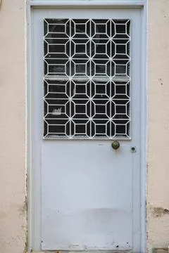 Front shoot of open gray colored metal door with traditional turkish pattern Stock Photos