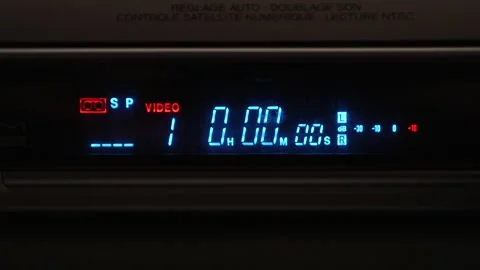 Front shot closeup on vhs vcr display Stock Footage 335705050