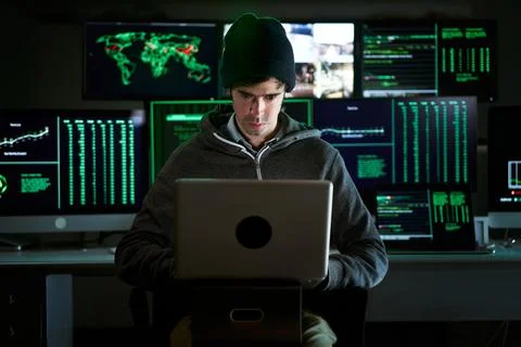 Front Shot from to Hacker Breaking into Corporate Data Servers from His Foto stock
