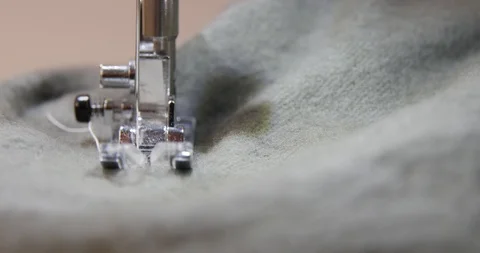 Front shot of sewing machine making DIY clothing. blurred background. Stock Footage 120043827