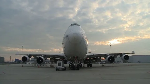 Front side of airplane standing and parked at airport. (Time-lapse) Stock Footage 72691614