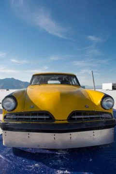 Front side of an American Hot Rod painted in yellow Stock Photos