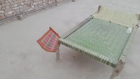 Front Side Angle of a Traditional Pakistani Charpai Video stock 347341477