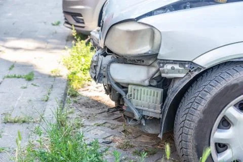 Front side of broken and damaged car in traffic crash accident Stock Photos