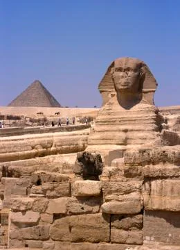 Front side view on sphinx with tourists, egypt Stock Photos