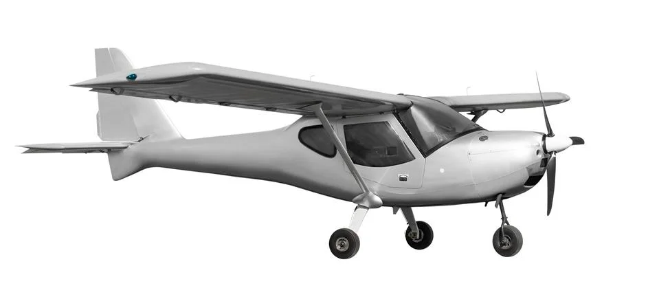 Front side view of white light aircraft with piston engine. Isolated on white Stock Photos