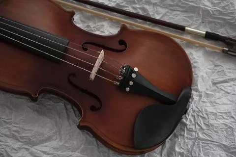 Front side of violin put on background,blurry light around 스톡 사진