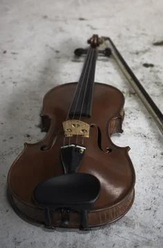 Front side of violin put on grunge surface background, Stockfoto's