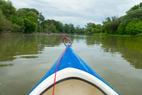 Front of a small boat on the river Stock Photos