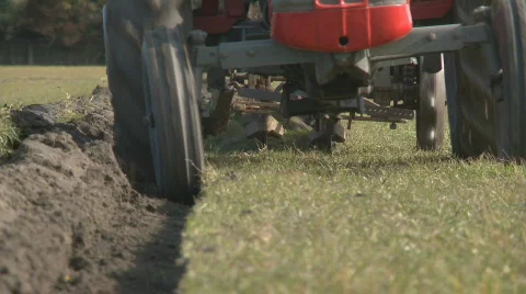 Front of small tractor ploughing Stock Footage 859288