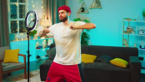 In front of the smartphone camera guy making a funny dancing to recording for Stock Footage 146474675
