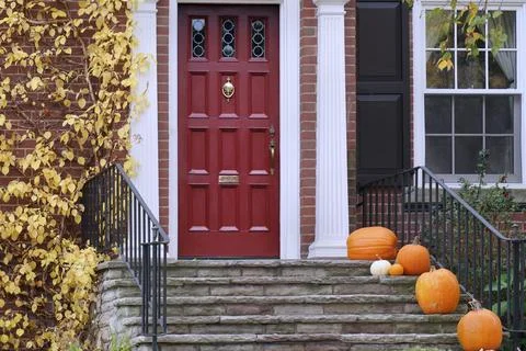 Front steps with pumpkins for fall decorations Stock Photos