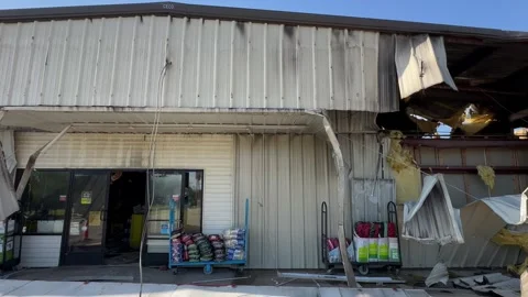 Front of store Dollar General Store fire Stock Footage 333780818