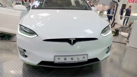 The front of the Tesla brand car in the bazaar Stock Footage