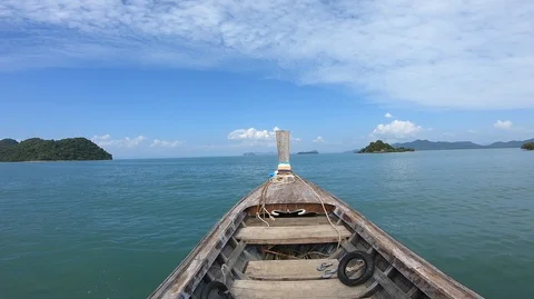 Front of Thai Long Tail Boat as it goes through the Gulf of Thailand, wider Video stock 127310857