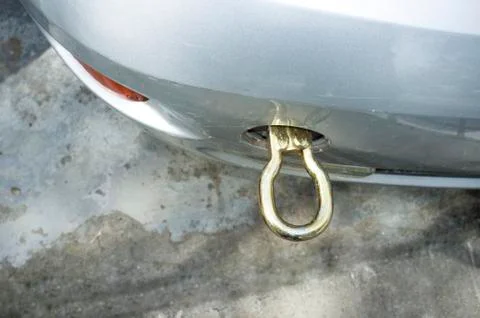 Front towing hook assembled to a broken car Stock Photos