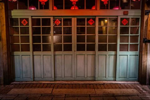 A front of a traditional Taiwanese house with its doors closed. Stock Photos