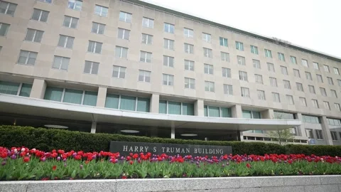 Front turning view of Harry S Truman Department of State building in Washington Stock Footage 152846799