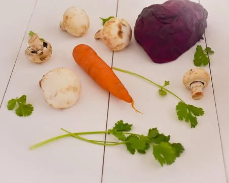 Front vegetables on white table 스톡 사진