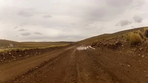 Front of vehicle view driving over large puddle Stock-Footage 108835153