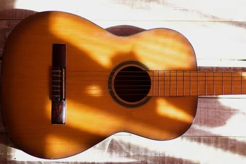 Front view of an acoustic guitar Stock Photos