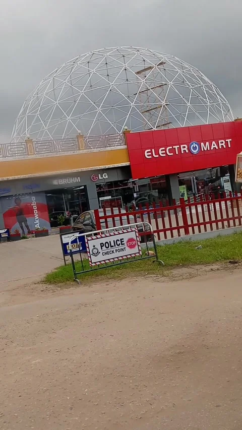 Front view and parking lot of Electromart, LG and Bruhm shop Stock Footage 317276401