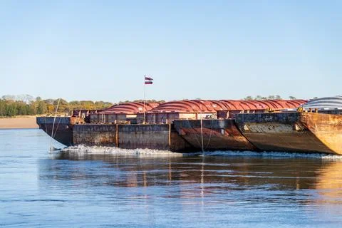 Front view of approaching freight barges coming upstream on Mississippi Stock Photos