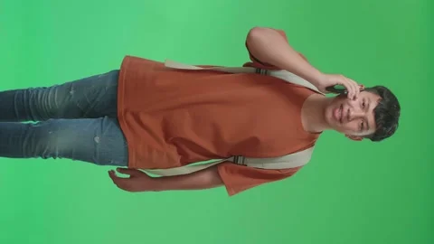 The Front View Of Asian Boy Student Wearing A Mask, Backpack, Brown T-Shirt Stock Footage 168658271