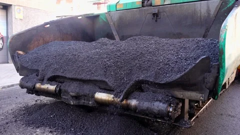 Front view of asphalt paving machine charged with warm mix asphalt 2 Stock Footage 253230817