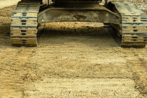 Front view of backhoe tracks Foto stock