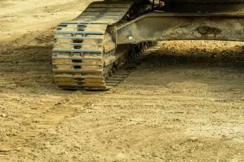 Front view of backhoe tracks Stock Photos