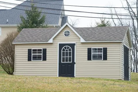 Front view of a backyard tool shed Stock Photos