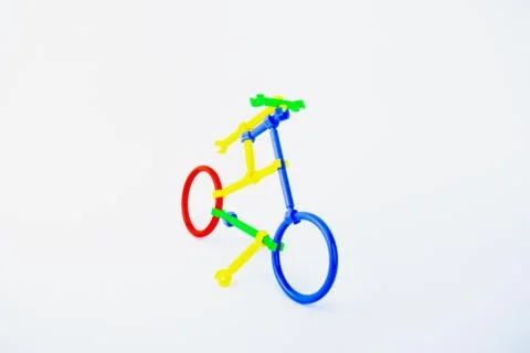 Front view of a bicycle made of plastic shape shifting toy on a white isolate Stock Photos