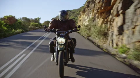 Front view of a Biker riding through a beautiful place Stock Footage 279269635